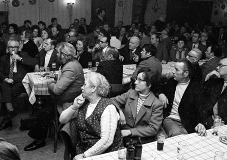 Concerned faces predominate at the tenants' protest meeting of RAG