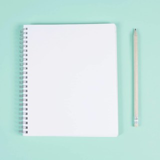 Blank spiral notebook with pencil turquoise background