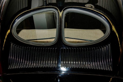 Rear section of historic Volkswagen VW Pretzel Beetle from 1938 with split rear window and 46 air vents Ventilation vents in radiator grille of bonnet