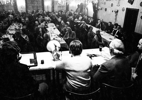 Concerned faces predominate at the tenants' protest meeting of RAG
