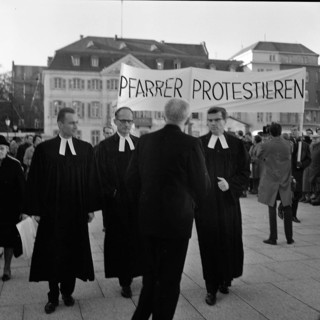 Those who support the Vietnam War betray the gospel of love. Pastors protest. With these slogans and sometimes wearing their robes