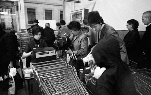 The work of a housewife and mother shopping for groceries at the supermarket and Aldi