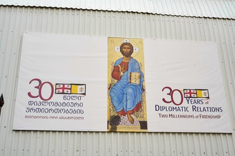 Banner next to a church in the Old City