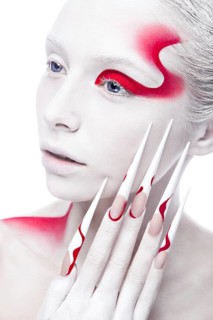 Art fashion girl with long color nails