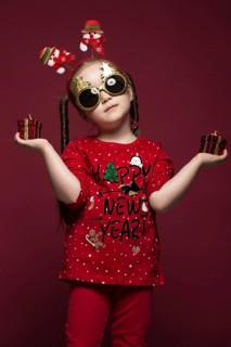 Funny little girl in the New Year's image