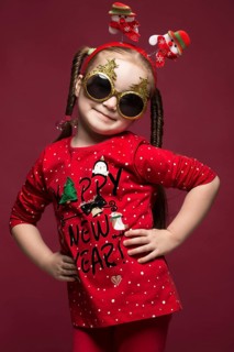 Funny little girl in the New Year's image