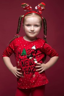 Funny little girl in the New Year's image