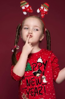 Funny little girl in the New Year's image