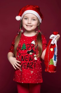 Funny little girl in the New Year's image