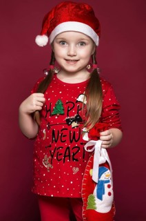 Funny little girl in the New Year's image