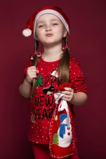 Funny little girl in the New Year's image