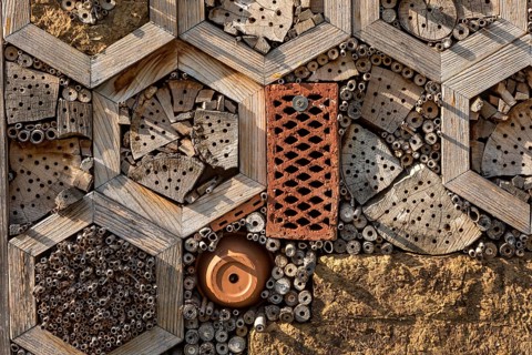 Insect hotel made of natural materials such as clay