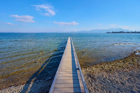 Lake Ciemsee with wooden jetty