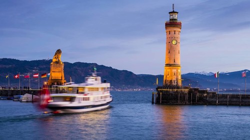 Harbour with lighthouse and Bavarian Lion