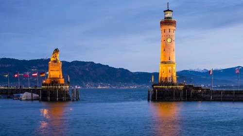 Harbour with lighthouse and Bavarian Lion