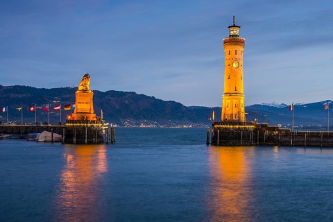 Harbour with lighthouse and Bavarian Lion
