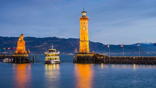 Harbour with lighthouse and Bavarian Lion