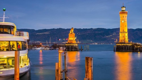 Harbour with lighthouse and Bavarian Lion