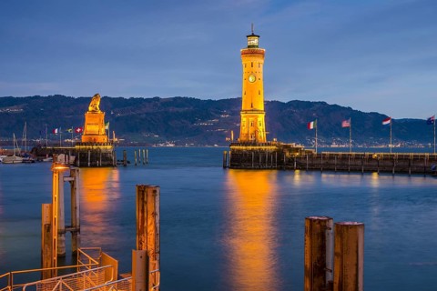 Harbour with lighthouse and Bavarian Lion
