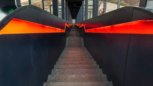 Dark illuminated staircase downwards