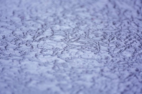 Frozen surface with water
