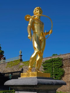 Sculpture The Lurenblaeser in the palace garden of the Lower Orangery in Weilburg Castle