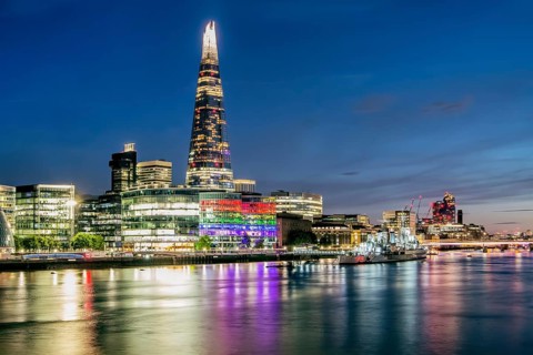 Thames Embankment with The Shard skyscraper at night