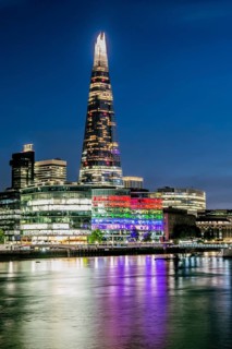 Thames Embankment with The Shard skyscraper at night