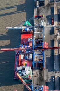 Aerial view of a feeder ship at the Burchardkai terminal