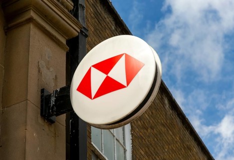 Wall hanging sign for HSBC bank branch on High Street