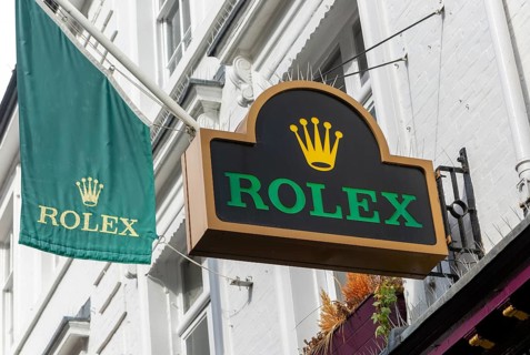 Rolex advertising sign and banner flag outside jeweller shop