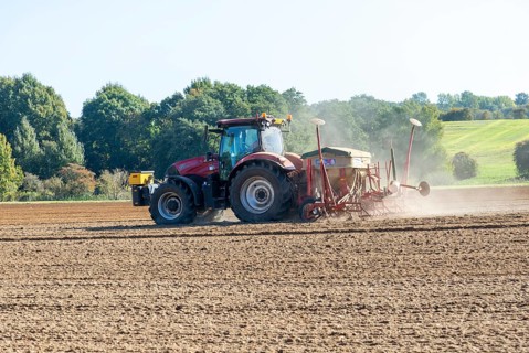 CASE 12 150 red tractor harrowing fiels