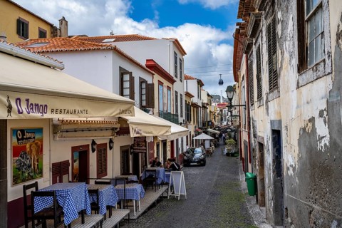 Alley with restaurants in the old town