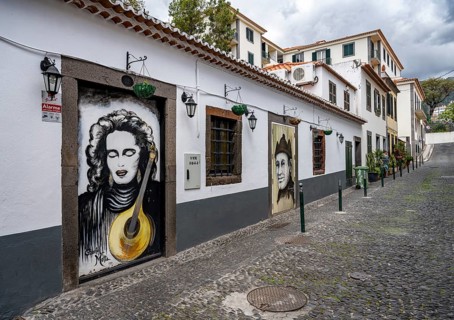 Alley with colourfully painted doors