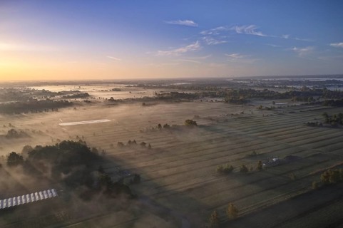 Aerial view of the Kirchwerder Wiesen nature reserve in Hamburg's Vier- und Marschlanden in the morning mist