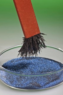 Bar Magnet Separating Iron Filings from a Mixture with Copper Sulphate