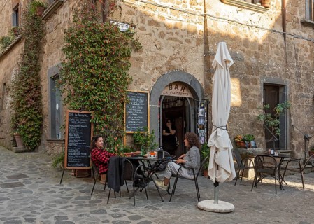 Two women at a street cafe