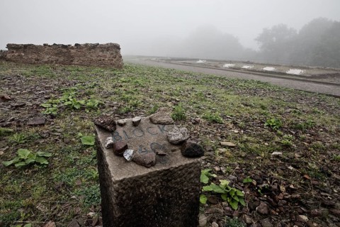 Memorial stone for camp barrack Block 40 at beech forest concentration camp