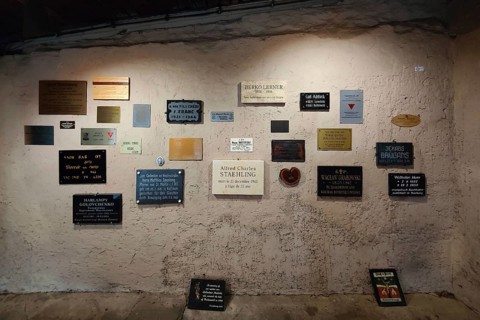 Memorial plaques in the crematorium of the camp