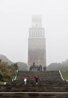 Stairs to the group of figures by Fritz Cremer with the bell tower