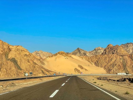 Car driving in the sunshine on the Sharm el-Sheikh Dahab road