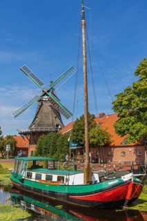 Gallery windmill with canal boat in Ostgrossefehn