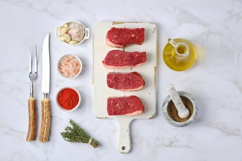 Top view of raw beef brisket flat steak with spice ready for cooking