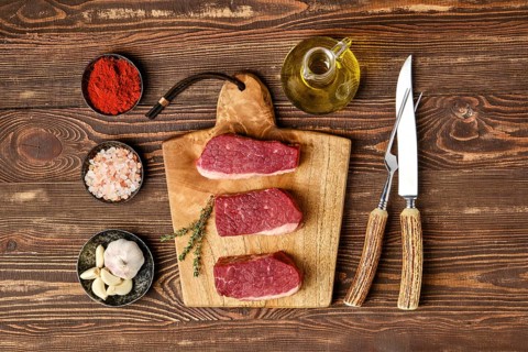 Top view of raw beef brisket flat steak with spice
