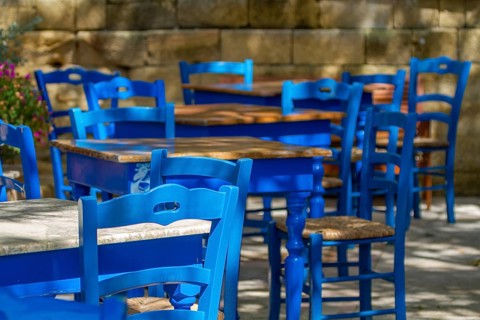 Blue tables and chairs in a cafe