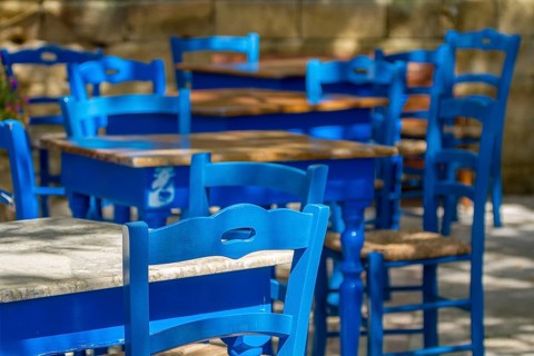 Blue tables and chairs in a cafe