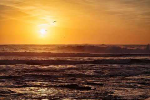Waves at sunset on the Atlantic Ocean