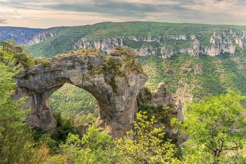 Stone arch above the Gorges du Tarn in the Cevennes National Park. Massif Central France