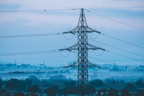 Electricity grid post during sunrise in the province of Gerona north of Catalonia Spain