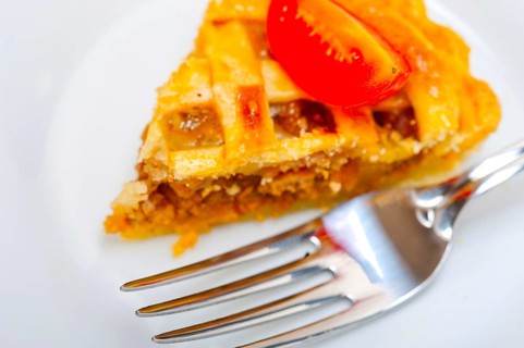 Fresh baked home made beef pie macro closeup